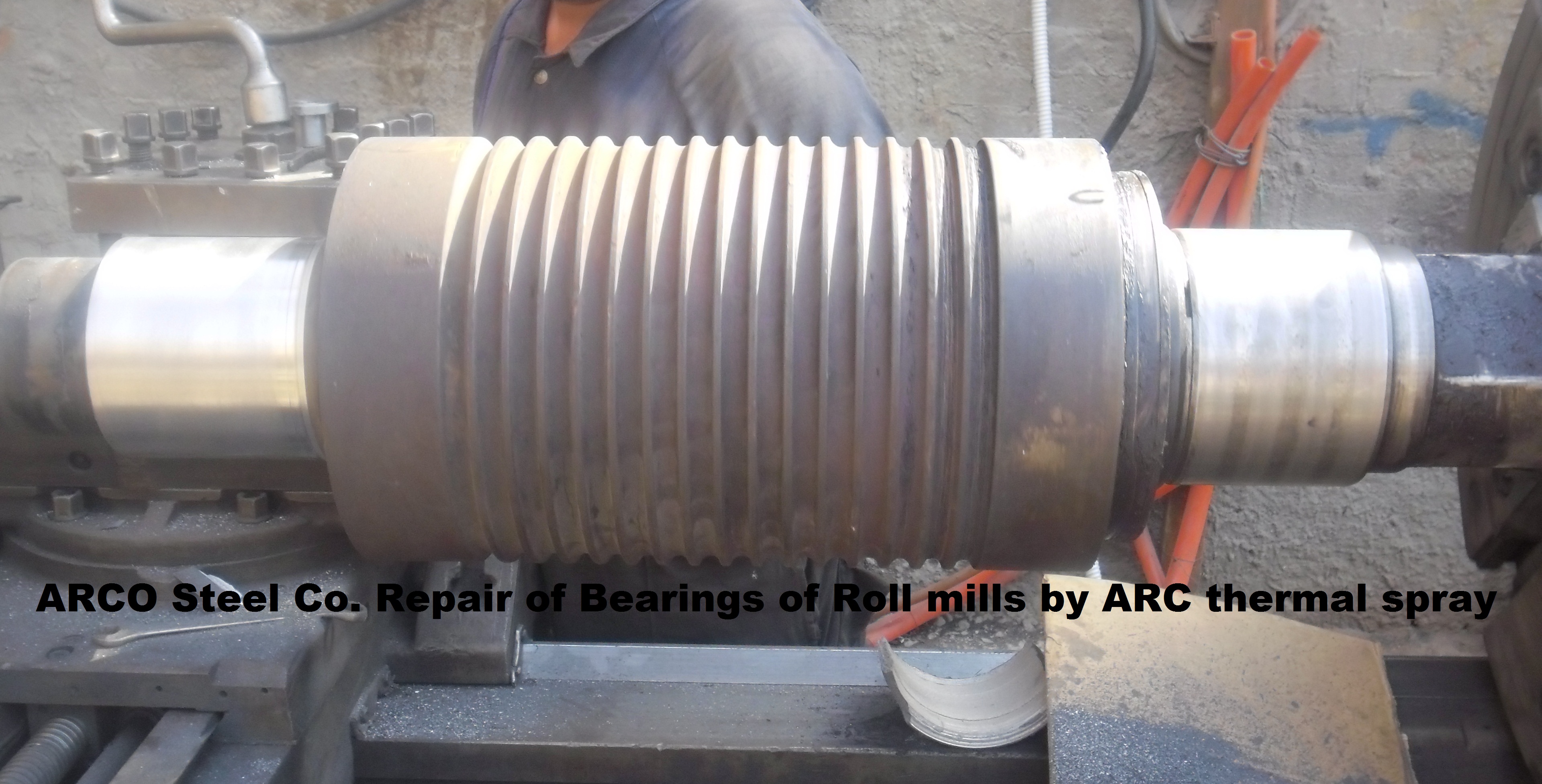 REPAIRING OF STEEL ROLLERS BY ARC SPRAY OF ARCO STEEL COMPANY